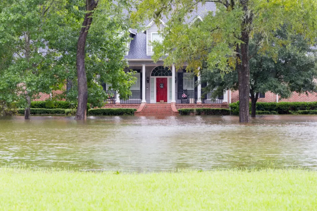 Residential Water Extraction Specialists. exterior shot home during flood